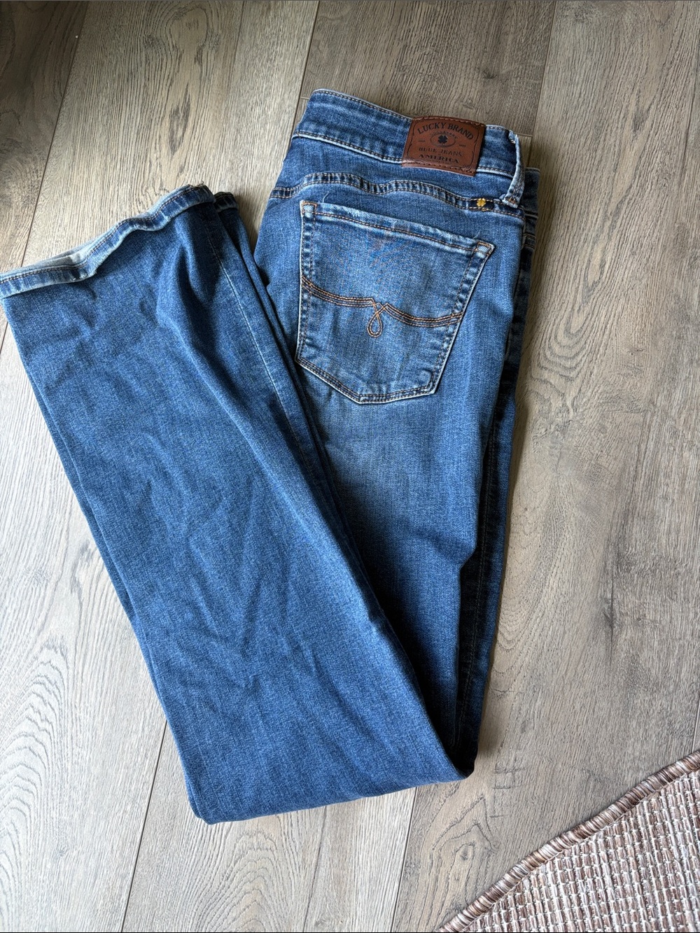 Lucky Brand Indigo Blue Denim Jeans with Leather Patch
